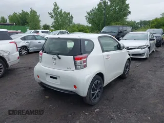 2012 Scion iQ with VIN JTNJJXB08CJ019333, listed as a IAAI auction lot 42348785 with 138,501 mi miles and . Bid and sale history available at DreamBid. Image 4.