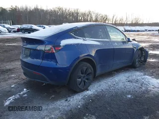 2024 Tesla Model Y Long Range with VIN 7SAYGDEE2RF129577, listed as a IAAI auction lot 41357180 with 6,697 mi miles and . Bid and sale history available at DreamBid. Image 4.