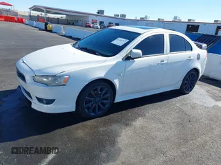 2009 Mitsubishi Lancer GTS with VIN JA3AU86W89U009617, listed as a IAAI auction lot 41409767 with 215,559 mi miles and . Bid and sale history available at carsss.com. Image 2.