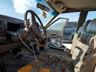 1990 Cadillac Brougham z VIN 1G6DW5476LR727151, wystawiony jako Copart lot #88145665 z przebiegiem Nie podano mil oraz Tytuł czysty. Historia ofert i sprzedaży dostępna na DreamBid. Obrazek 7.