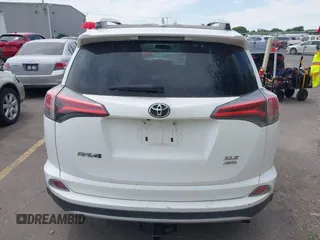 2016 Toyota RAV4 XLE с VIN 2T3RFREV2GW427622, выставлен на аукционе IAAI как лот 42415254 с пробегом 124 481 миль миль и . История ставок и продаж доступна на DreamBid. Изображение 16.