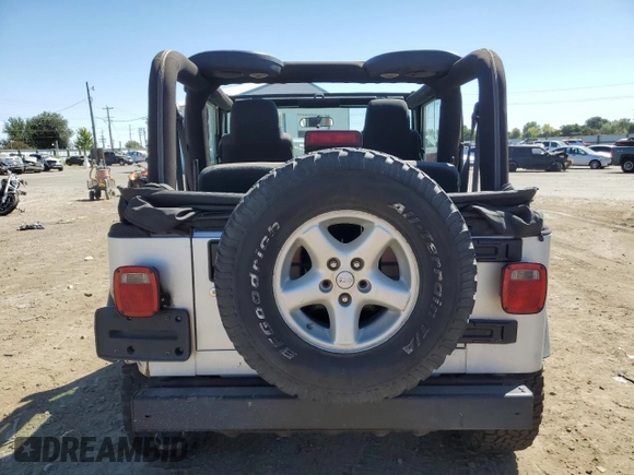 2006 Jeep Wrangler X with VIN 1J4FA39S66P717896, listed as a Copart auction lot 68147294 with 247,172 mi miles and Salvage Title. Bid and sale history available at carsss.com. Image 6.