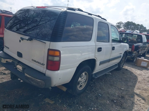 2003 Chevrolet Tahoe LT with VIN 1GNEC13Z33J145665, listed as a IAAI auction lot 41807970 with 307,997 mi miles. Bid and sale history available at carsss.com. Image 4.