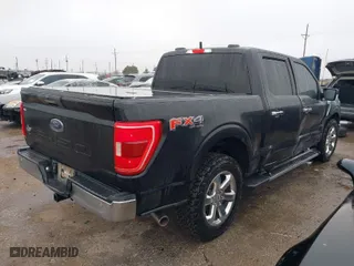 2021 Ford F-150 XL with VIN 1FTFW1E59MFC30173, listed as a IAAI auction lot 41445639 with 176,857 mi miles. Bid and sale history available at carsss.com. Image 4.