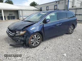 2014 Honda Odyssey Touring z VIN 5FNRL5H91EB047917, wystawiony jako Copart lot #58032125 z przebiegiem 196 660 mil mil oraz Szkoda całkowita • Salvage title. Historia ofert i sprzedaży dostępna na DreamBid. Obrazek 1.