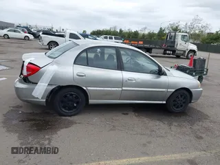2005 Kia Rio with VIN KNADC125556380753, listed as a IAAI auction lot 41794121 with 139,759 mi miles. Bid and sale history available at carsss.com. Image 13.