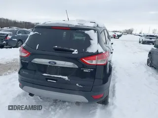 2016 Ford Escape Titanium with VIN 1FMCU9J96GUC08563, listed as a IAAI auction lot 41252475 with 120,404 mi miles. Bid and sale history available at carsss.com. Image 16.