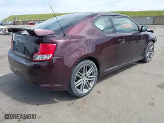 2013 Scion tC with VIN JTKJF5C7XD3064777, listed as a IAAI auction lot 42008710 with 147,808 mi miles. Bid and sale history available at carsss.com. Image 4.