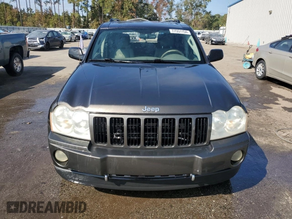 2006 Jeep Grand Cherokee Laredo with VIN 1J4HS48N96C357909, listed as a Copart auction lot 77551154 with 136,235 mi miles and Salvage Title. Bid and sale history available at carsss.com. Image 5.
