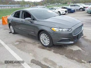 2016 Ford Fusion SE Hybrid z VIN 3FA6P0LU3GR285684, wystawiony jako IAAI lot #42030949 z przebiegiem 131 451 mil mil oraz . Historia ofert i sprzedaży dostępna na DreamBid. Obrazek 1.