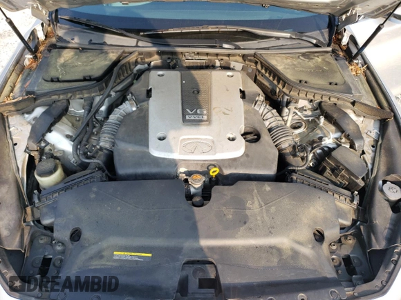 2015 Infiniti Q50 Premium с VIN JN1BV7AP6FM340613, выставлен на аукционе Copart как лот 59041625 с пробегом 192 451 миль миль и Списание • Salvage title. История ставок и продаж доступна на DreamBid. Изображение 11.