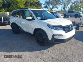 2021 Honda Pilot Special Edition with VIN 5FNYF5H24MB037208, listed as a IAAI auction lot 41319708 with 64,633 mi miles and . Bid and sale history available at carsss.com. Image 1.