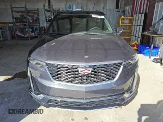 2021 Cadillac XT6 Premium Luxury z VIN 1GYKPDRS7MZ179150, wystawiony jako Copart lot #44894625 z przebiegiem 48 869 mil mil oraz Czysty tytuł • Clean title. Historia ofert i sprzedaży dostępna na DreamBid. Obrazek 5.