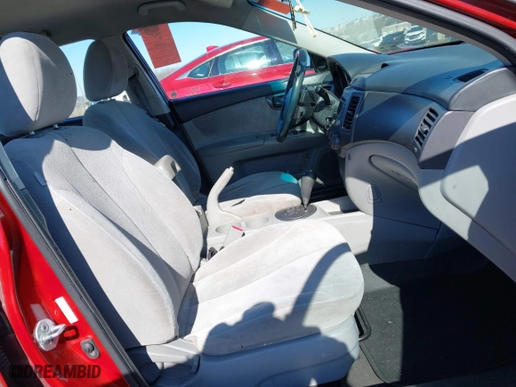 2009 Kia Optima LX with VIN KNAGE228X95314931, listed as a IAAI auction lot 41890304 with 217,901 mi miles. Bid and sale history available at carsss.com. Image 5.