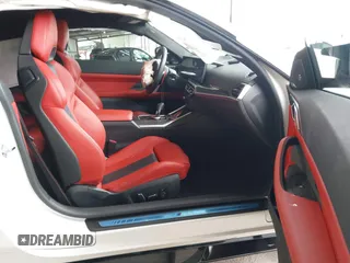 2024 BMW M4 Competition xDrive with VIN WBS43AZ0XRCS01913, listed as a IAAI auction lot 41905104 with 20,912 mi miles and . Bid and sale history available at DreamBid. Image 5.