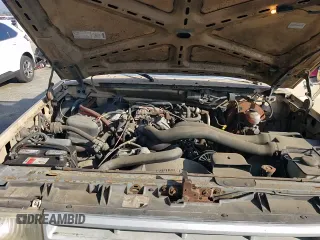 1990 Ford F-250 z VIN 1FTHF25H6LLA09106, wystawiony jako Copart lot #84034684 z przebiegiem 41 091 mil mil oraz Szkoda całkowita • Salvage title. Historia ofert i sprzedaży dostępna na DreamBid. Obrazek 13.