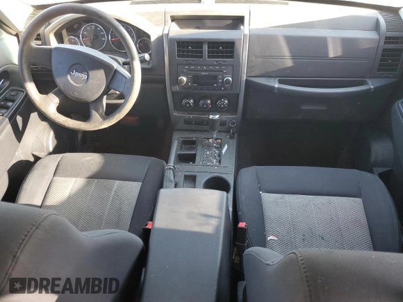 2010 Jeep Liberty Sport with VIN 1J4PP2GKXAW118174, listed as a Copart auction lot 52157345 with 160,033 mi miles and Clean Title. Bid and sale history available at DreamBid. Image 8.