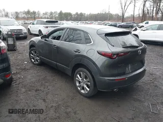 2021 Mazda CX-30 Select with VIN 3MVDMBBL2MM312752, listed as a IAAI auction lot 41933342 with 52,213 mi miles and . Bid and sale history available at DreamBid. Image 3.