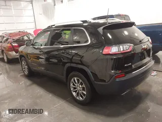 2021 Jeep Cherokee Latitude Lux with VIN 1C4PJMMX2MD107902, listed as a IAAI auction lot 41229913 with 61,195 mi miles and . Bid and sale history available at DreamBid. Image 3.