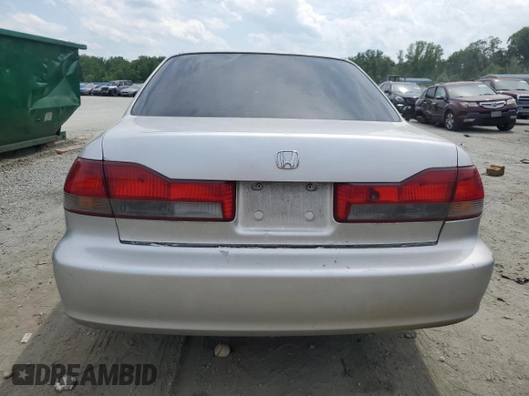 2001 Honda Accord LX z VIN 1HGCG564X1A135855, wystawiony jako Copart lot #57346815 z przebiegiem 235 585 mil mil oraz Szkoda całkowita • Salvage title. Historia ofert i sprzedaży dostępna na DreamBid. Obrazek 6.