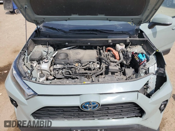 2022 Toyota RAV4 Hybrid XLE Premium with VIN 4T3B6RFV8NU101319, listed as a Copart auction lot 60987535 with 100,070 mi miles and Salvage title. Bid and sale history available at DreamBid. Image 11.