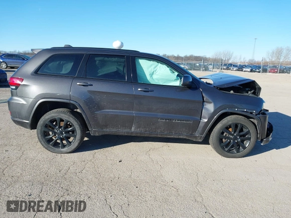 2017 Jeep Grand Cherokee Laredo with VIN 1C4RJFAG7HC769642, listed as a IAAI auction lot 41367874 with 128,095 mi miles. Bid and sale history available at carsss.com. Image 13.
