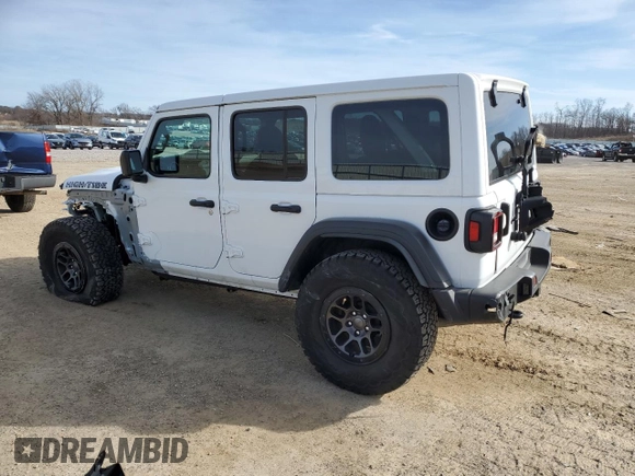 2023 Jeep Wrangler Sport S with VIN 1C4HJXDGXPW665818, listed as a Copart auction lot 48357105 with 9,803 mi miles and Clean Title. Bid and sale history available at DreamBid. Image 2.