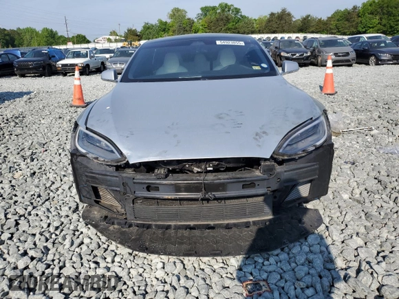 2017 Tesla Model S 60 with VIN 5YJSA1E15HF203248, listed as a Copart auction lot 54923855 with 84,214 mi miles and Salvage title. Bid and sale history available at DreamBid. Image 5.