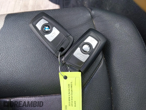 2015 BMW 4 Series 428i xDrive with VIN WBA4C9C52FD331620, listed as a IAAI auction lot 42556526 with 115,674 mi miles and . Bid and sale history available at DreamBid. Image 11.