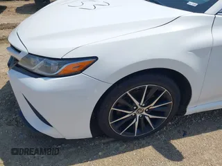 2018 Toyota Camry LE z VIN JTNB11HK2J3048094, wystawiony jako IAAI lot #42331953 z przebiegiem 239 000 mil mil oraz . Historia ofert i sprzedaży dostępna na DreamBid. Obrazek 6.