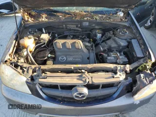 2002 Mazda Tribute LX with VIN 4F2YU09172KM62596, listed as a Copart auction lot 76912034 with 225,892 mi miles and Salvage Title. Bid and sale history available at carsss.com. Image 21.