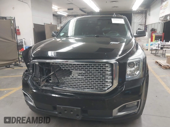 2016 GMC Yukon XL Denali with VIN 1GKS2HKJ8GR102213, listed as a IAAI auction lot 41818737 with 154,607 mi miles and . Bid and sale history available at DreamBid. Image 12.