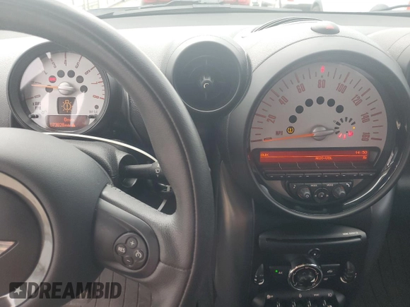 2014 MINI Countryman S z VIN WMWZC3C57EWP51864, wystawiony jako Copart lot #71233944 z przebiegiem 73 828 mil mil oraz Szkoda całkowita • Salvage title. Historia ofert i sprzedaży dostępna na DreamBid. Obrazek 9.