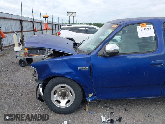 1998 Ford F-150 XL with VIN 2FTZX0722WCA65198, listed as a IAAI auction lot 42145451 with 188,529 mi miles and . Bid and sale history available at DreamBid. Image 16.