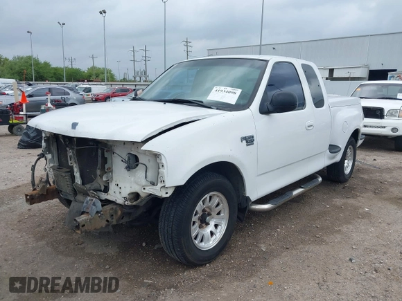 2001 Ford F-150 XL with VIN 2FTRX07L21CA73710, listed as a IAAI auction lot 41934098 with 1 mi miles. Bid and sale history available at carsss.com. Image 21.