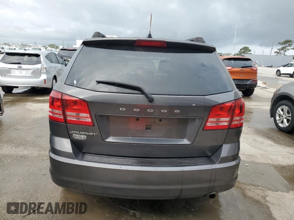 2016 Dodge Journey American Value with VIN 3C4PDCAB8GT138354, listed as a Copart auction lot 52383675 with 142,174 mi miles and Salvage Title. Bid and sale history available at DreamBid. Image 6.