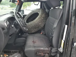 2012 Jeep Wrangler Unlimited Sport z VIN 1C4BJWDG9CL102626, wystawiony jako Copart lot #58421455 z przebiegiem 128 421 mil mil oraz Szkoda całkowita • Salvage title. Historia ofert i sprzedaży dostępna na DreamBid. Obrazek 7.