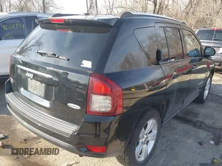 2014 Jeep Compass Latitude with VIN 1C4NJDEBXED661930, listed as a IAAI auction lot 41501558 with 94,133 mi miles and . Bid and sale history available at DreamBid. Image 4.