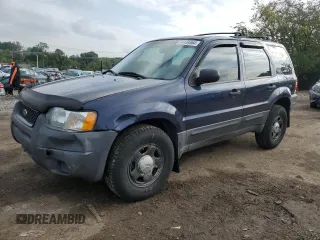 2004 Ford Escape XLS with VIN 1FMYU92104KA21454, listed as a Copart auction lot 74139564 with 217,731 mi miles and Salvage Title. Bid and sale history available at carsss.com. Image 1.