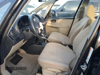 2011 Suzuki SX4 LE with VIN JS2YC5A29B6301704, listed as a Copart auction lot 79430574 with 173,287 mi miles and Salvage Title. Bid and sale history available at carsss.com. Image 7.