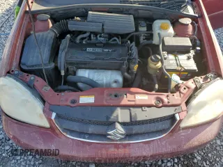 2006 Suzuki Forenza z VIN KL5JD56Z76K402080, wystawiony jako Copart lot #72608244 z przebiegiem 162 183 mil mil oraz Szkody całkowita. Historia ofert i sprzedaży dostępna na DreamBid. Obrazek 11.
