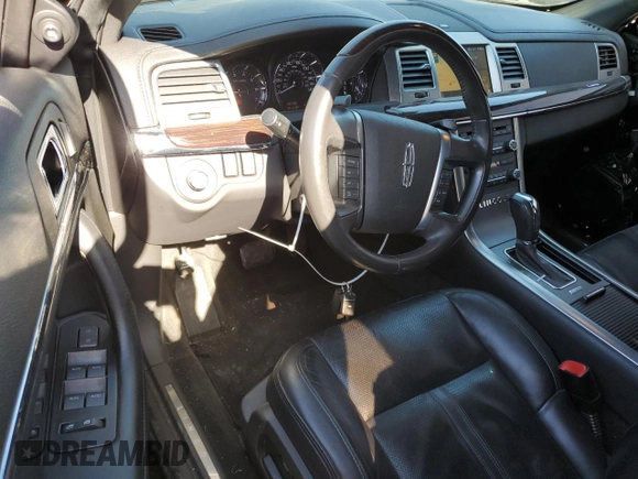 2011 Lincoln MKS with VIN 1LNHL9DR7BG615397, listed as a Copart auction lot 52047015 with 111,720 mi miles and Salvage Title. Bid and sale history available at DreamBid. Image 8.
