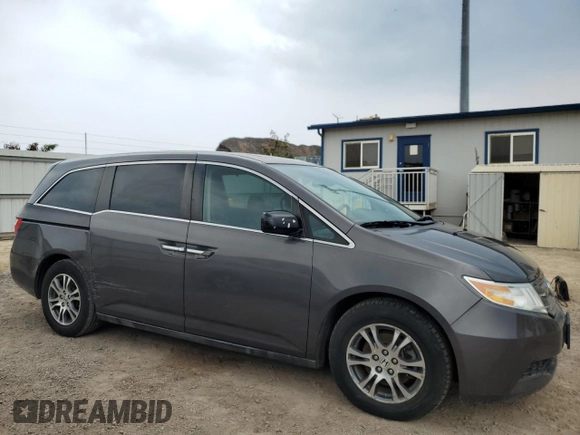 2013 Honda Odyssey EX-L with VIN 5FNRL5H68DB070079, listed as a Copart auction lot 52183895 with 173,428 mi miles and Clean title. Bid and sale history available at DreamBid. Image 4.