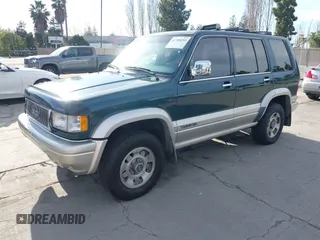 1996 Isuzu Trooper z VIN JACDJ58V4T7918002, wystawiony jako IAAI lot #41700255 z przebiegiem 203 951 mil mil oraz . Historia ofert i sprzedaży dostępna na DreamBid. Obrazek 2.