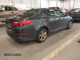 2015 Kia Optima LX with VIN 5XXGM4A76FG381155, listed as a IAAI auction lot 42373920 with 112,359 mi miles and . Bid and sale history available at DreamBid. Image 4.