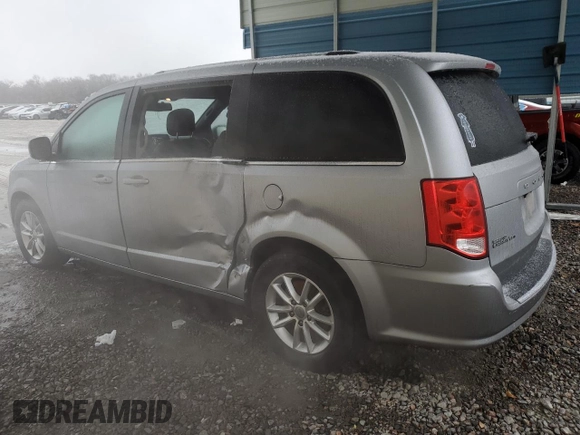 2019 Dodge Grand Caravan SXT with VIN 2C4RDGCG1KR595981, listed as a Copart auction lot 88133645 with 104,852 mi miles and Salvage Title. Bid and sale history available at DreamBid. Image 2.