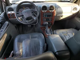 2004 GMC Envoy SLT with VIN 1GKET16S446131726, listed as a Copart auction lot 76033954 with Not Provided miles and Salvage Title. Bid and sale history available at DreamBid. Image 8.