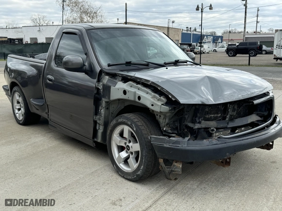 2003 Ford F-150 Lightning with VIN 2FTRF073X3CA56501, listed as a IAAI auction lot 42083560 with 112,754 mi miles. Bid and sale history available at carsss.com. Image 5.