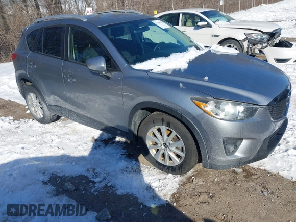 2013 Mazda CX-5 Touring with VIN JM3KE2CE7D0129623, listed as a IAAI auction lot 41344623 with 147,025 mi miles. Bid and sale history available at carsss.com. Image 1.
