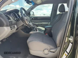 2012 Toyota Tacoma with VIN 3TMLU4EN6CM098434, listed as a Copart auction lot 56422005 with 151,228 mi miles and Salvage title. Bid and sale history available at DreamBid. Image 7.